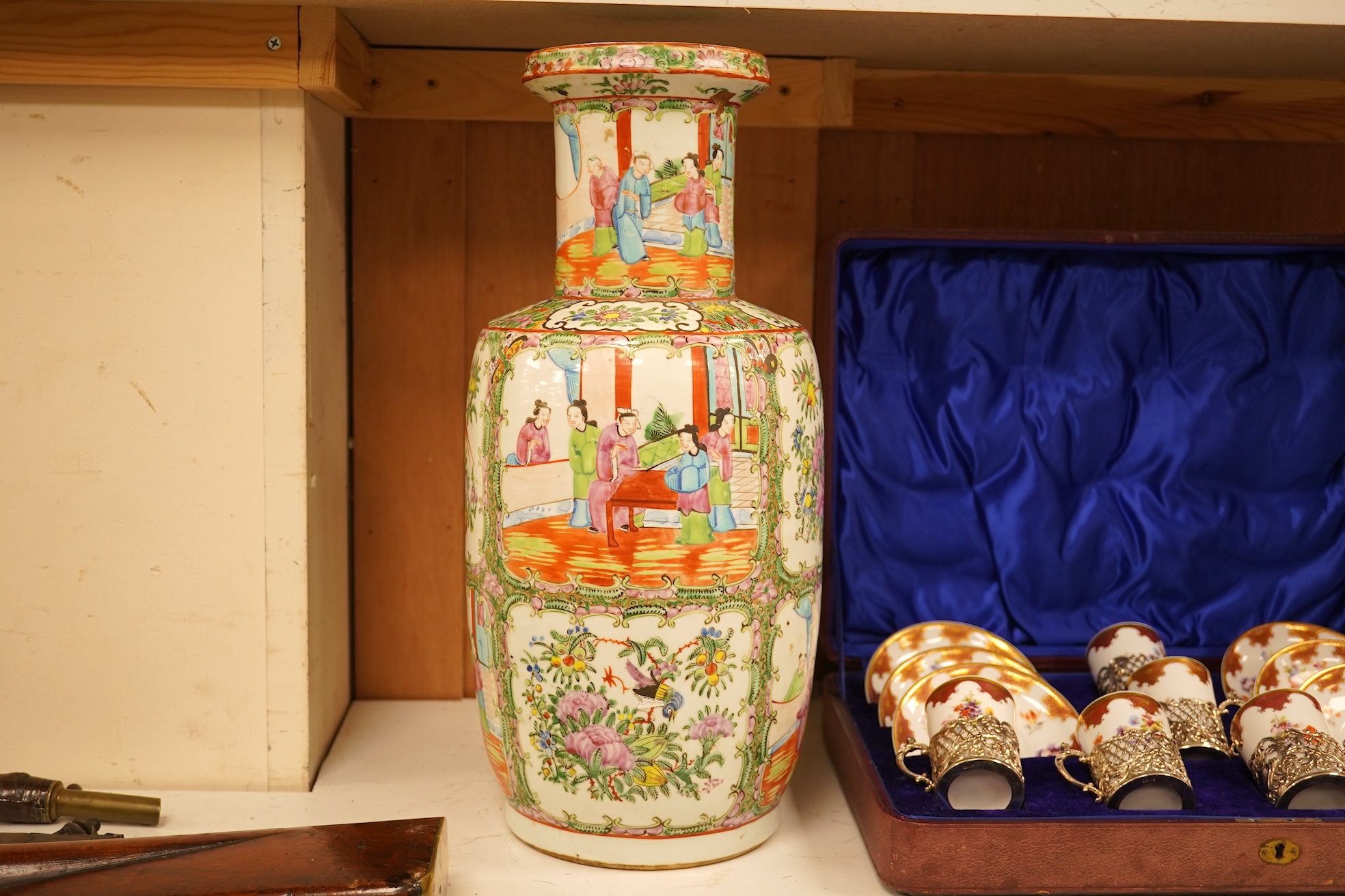 A 19th century Chinese famille rose baluster vase enamelled with flowers and figures, 44cm high